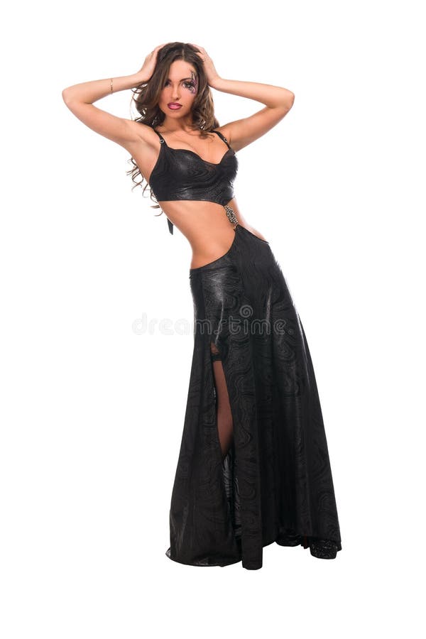 Fille avec le visage d'art et longtemps le cheveu bouclé foncé photographie stock libre de droits Fille avec le visage d'art et longtemps le cheveu bouclé foncé photographie stock libre de droits