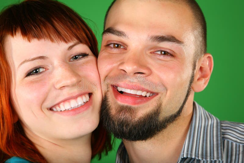 Fille avec les visages rouges de cheveu et de type photographie stock libre de droits Fille avec les visages rouges de cheveu et de type photographie stock libre de droits