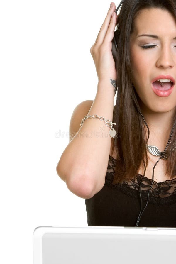 Fille de musique d'ordinateur portatif images libres de droits Fille de musique d'ordinateur portatif images libres de droits