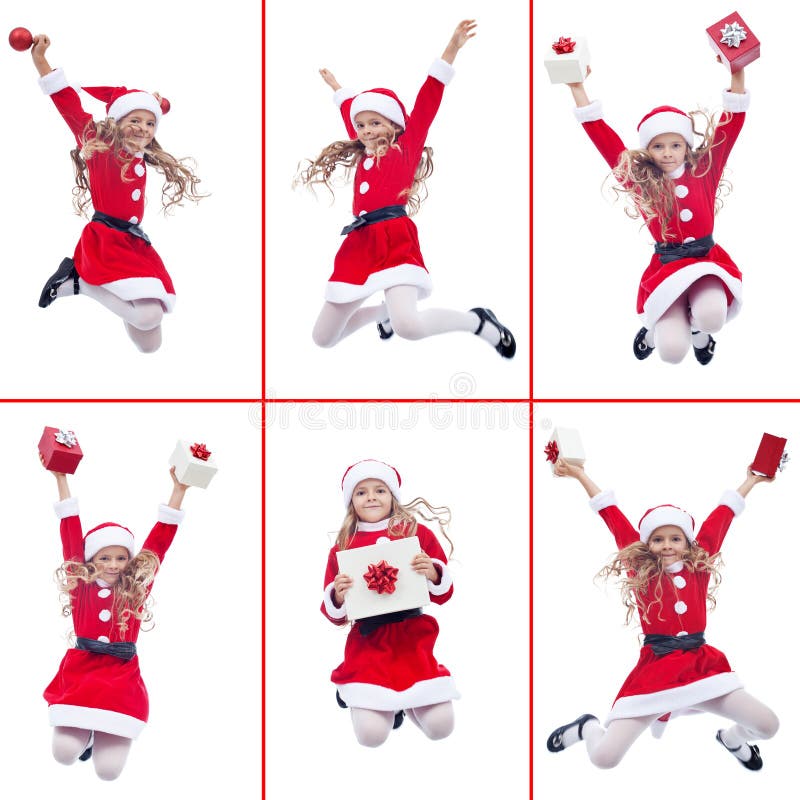 Fille heureuse avec sauter de costume de Santa photographie stock Fille heureuse avec sauter de costume de Santa photographie stock