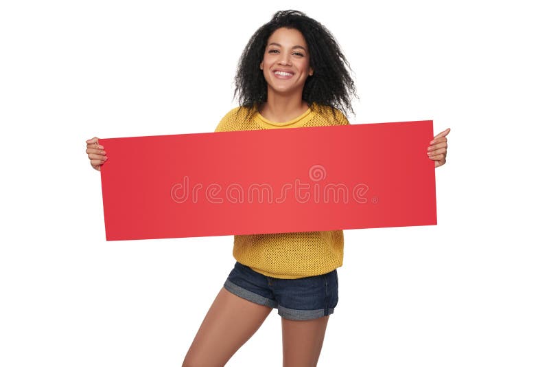 Fille heureuse d'afro-américain montrant la bannière vide images stock Fille heureuse d'afro-américain montrant la bannière vide images stock