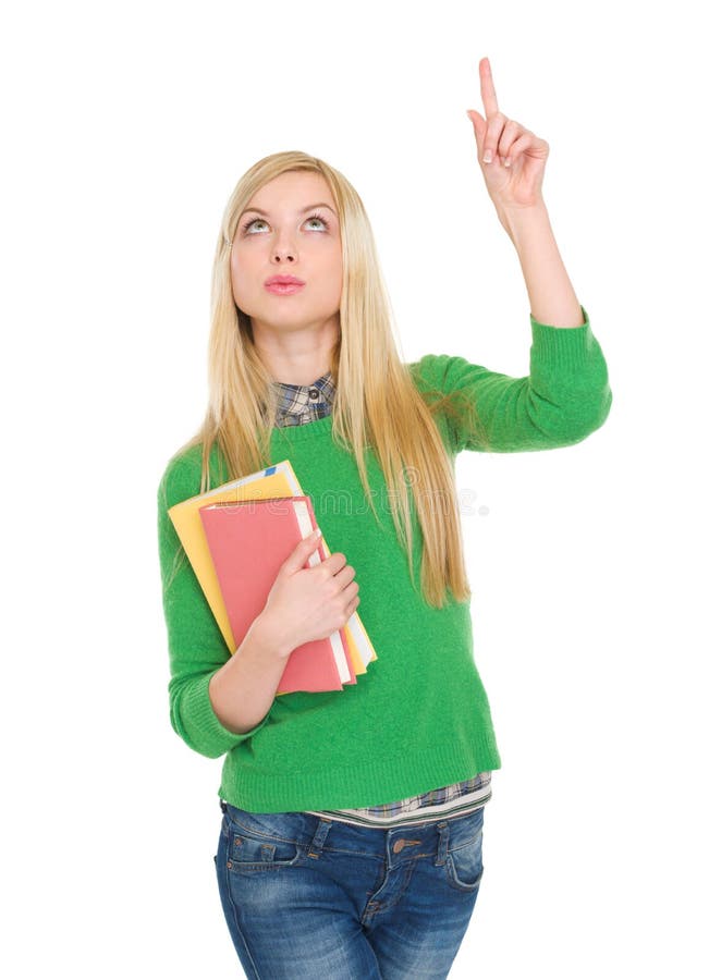 Fille heureuse d'étudiant se dirigeant vers le haut sur l'espace de copie images libres de droits Fille heureuse d'étudiant se dirigeant vers le haut sur l'espace de copie images libres de droits