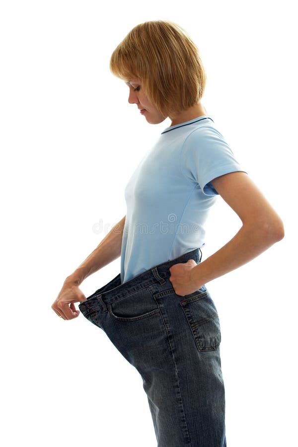 Jeune femme mince en jean grande taille photographie stock libre de droits