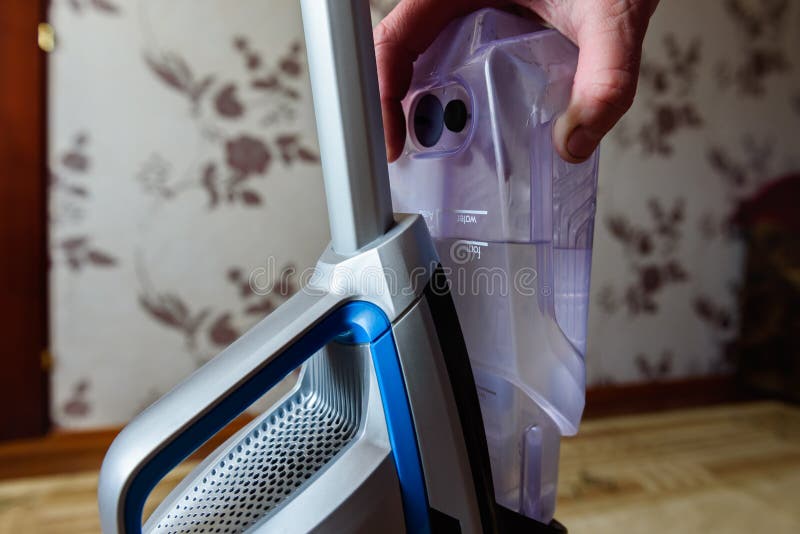 Filled Water Tank for Cordless Vacuum Cleaner. Stock Image Image of