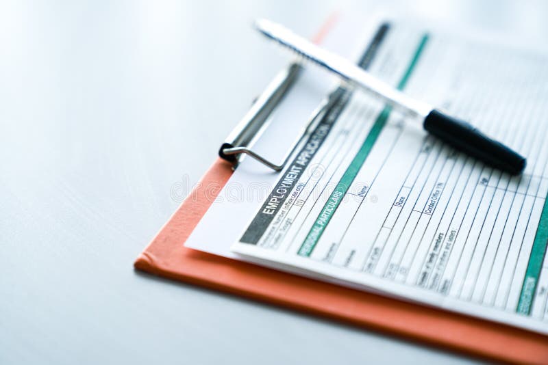 Filling the employment application form royalty free stock image