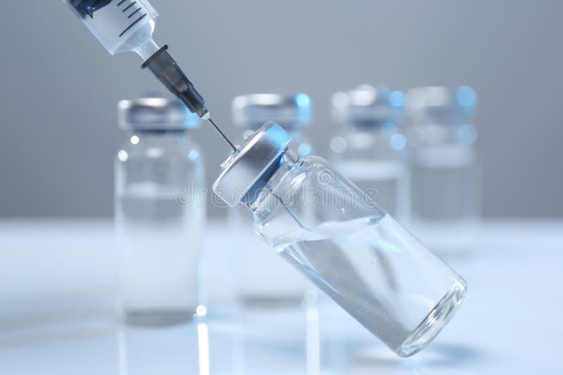 Filling of a Syringe by a Medicine from Vial Stock Image Image of glove, virus 18290341