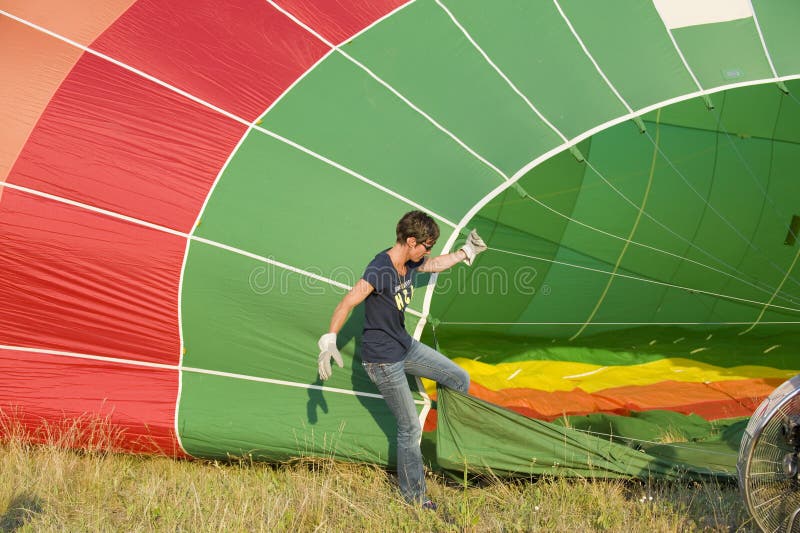 Filling up hot air balloon stock photo. Image of hold 19894544