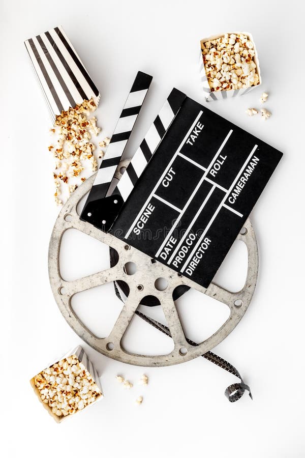 Popcorn with Clapperboard and Movie Film Reel. Cinema Background Stock Photo Image of roll