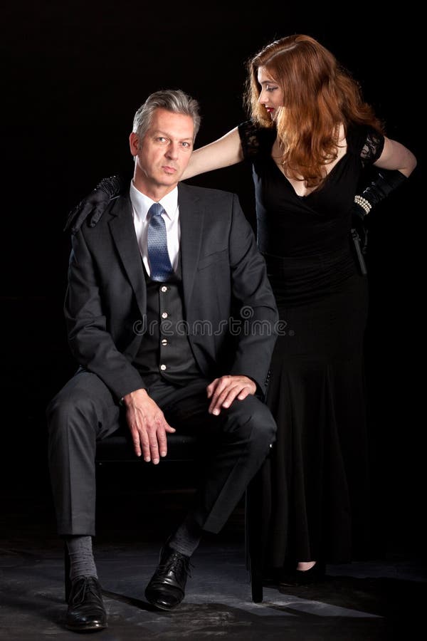 Filme dos pares da mulher do homem noir imagem de stock royalty free Filme dos pares da mulher do homem noir imagem de stock royalty free