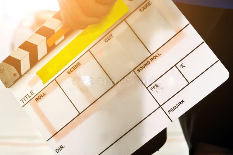 Film Slate, close up image of film production crew holding Film Slate on set. Film Slate, close up image of film production crew holding Film Slate on set