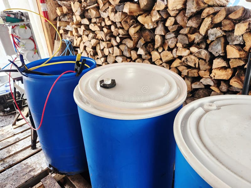 Maple Syrup Making. Osmotic Water Machine and Barrels Tool in