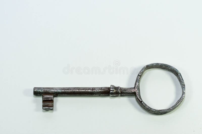 Fim oxidado da chave do ferro do vintage velho acima imagem de stock Fim oxidado da chave do ferro do vintage velho acima imagem de stock