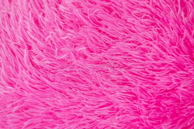 Fin vers le haut de texture hirsute ou de tapis de fourrure artificielle de rose photos stock Fin vers le haut de texture hirsute ou de tapis de fourrure artificielle de rose photos stock