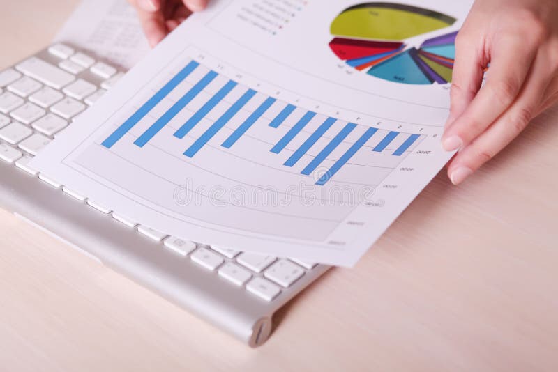 Financial charts and graphs on the table royalty free stock image Financial charts and graphs on the table royalty free stock image