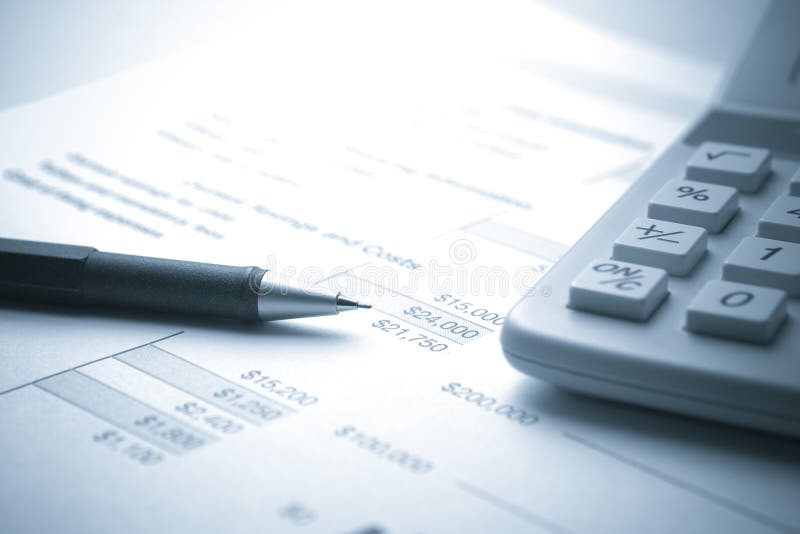 Financial Document with Pencil and Calculator