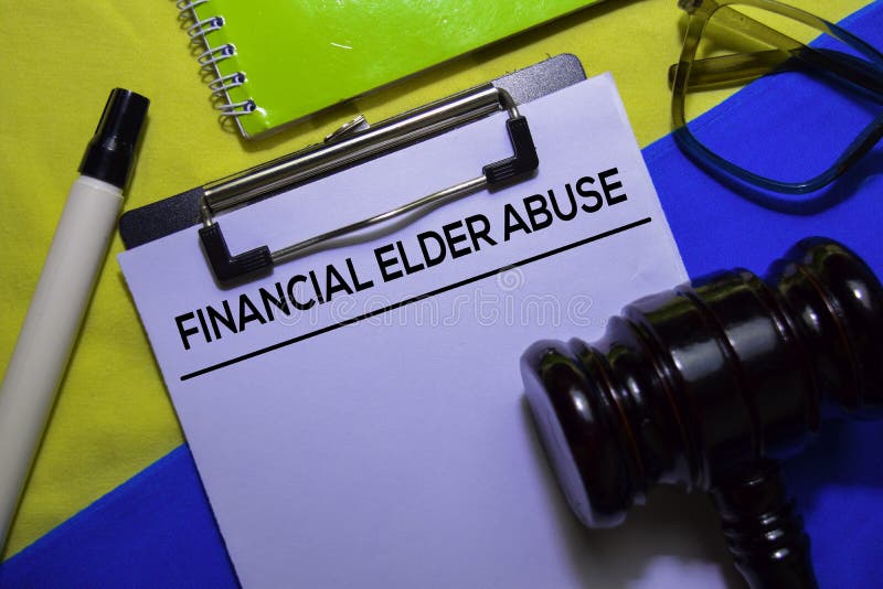 Financial Elder Abuse text on Document form and Gavel isolated on office desk. stock image