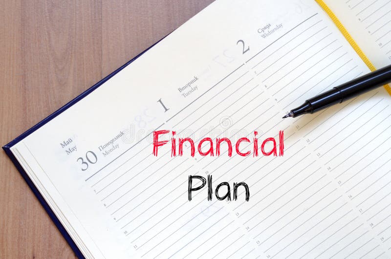 Financial plan text concept on notebook stock photos