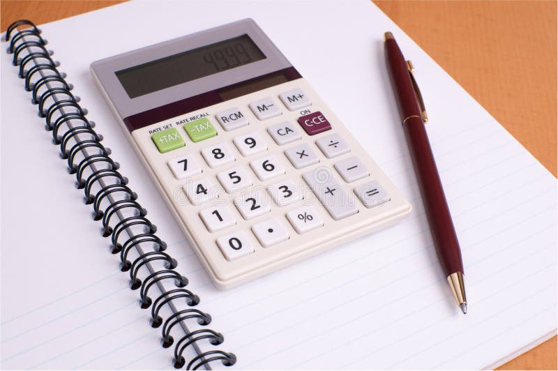 Financial Planning Notepad with Calculator and Pen Stock Image Image