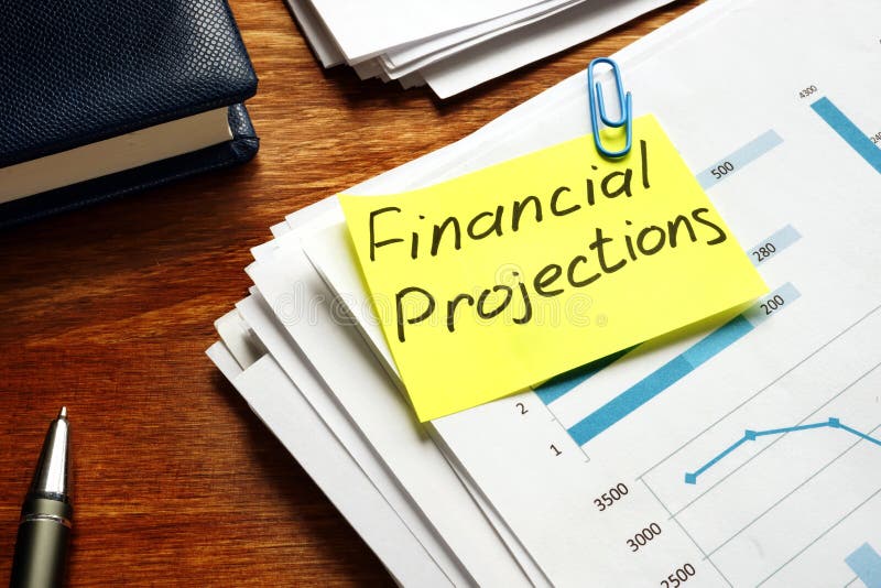 Financial Projections label on a pile of business documents