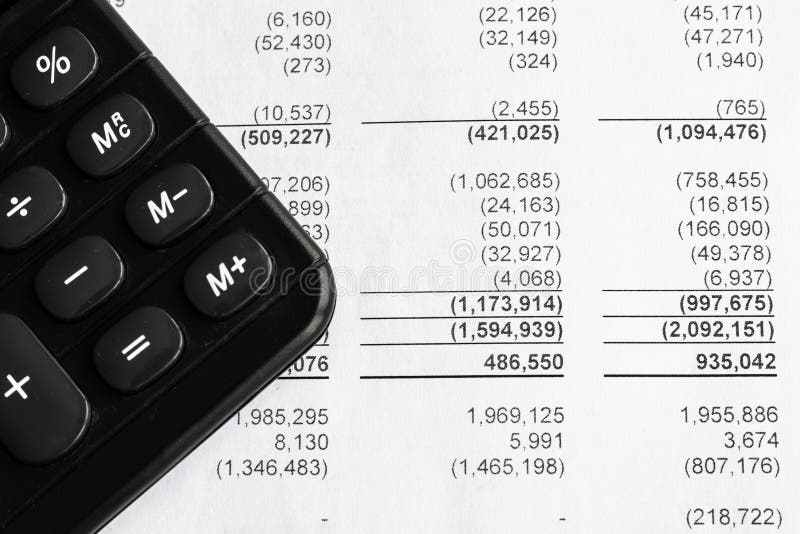 Financial statement report and eyeglass, business concept document is mock-up royalty free stock photography