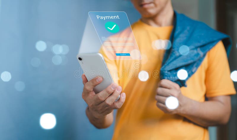 Financial technology, internet payments, and digital banking networks. The individual used a mobile phone to use mobile banking stock images