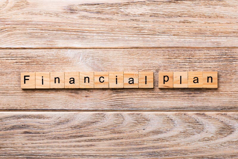 Finanzplanwort geschrieben auf hölzernen Block Finanzplantext auf Holztisch für Ihr Desing, Konzept lizenzfreie stockfotografie Finanzplanwort geschrieben auf hölzernen Block Finanzplantext auf Holztisch für Ihr Desing, Konzept lizenzfreie stockfotografie