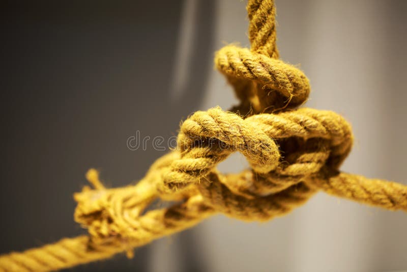 Fine aggrovigliata della corda su fotografie stock Fine aggrovigliata della corda su fotografie stock