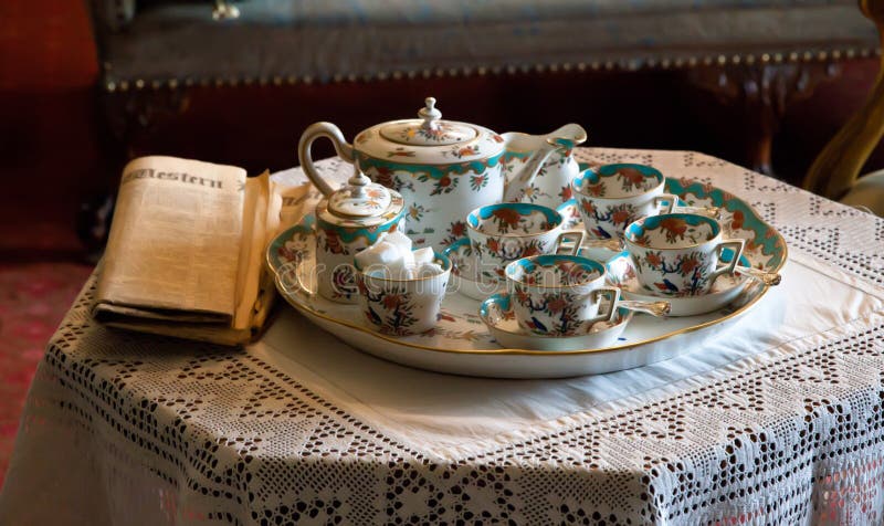Fine China tea set and paper royalty free stock image Fine China tea set and paper royalty free stock image