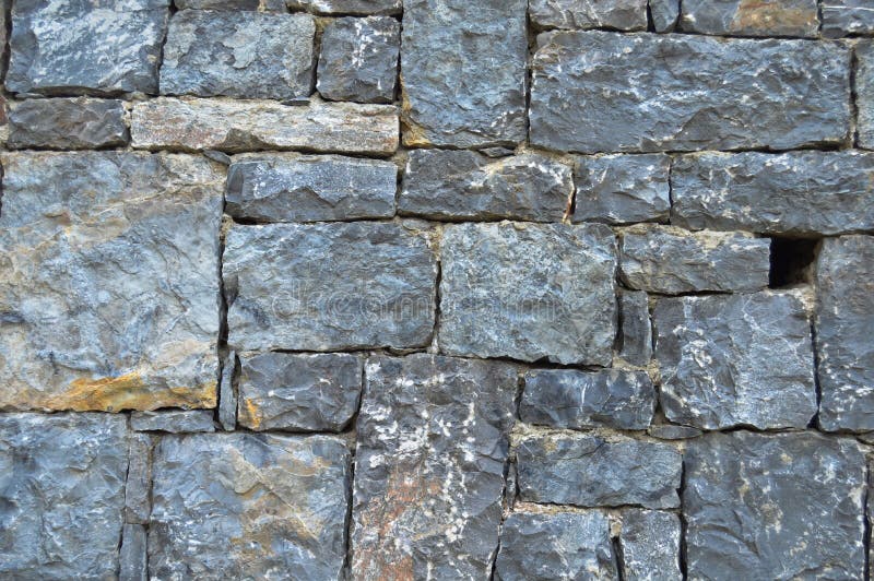 Fine cut blue stone wall stock image. Image of granite 145434675