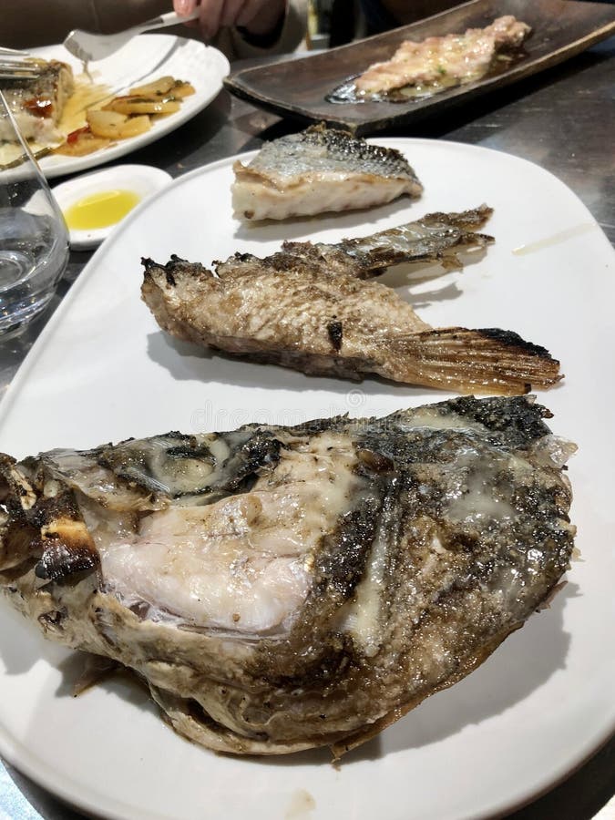 Fine dining, whole fish served at Michelin restaurant