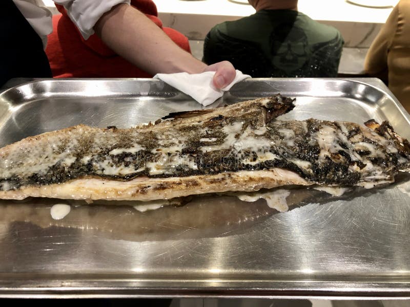 Fine dining, whole fish served at Michelin restaurant