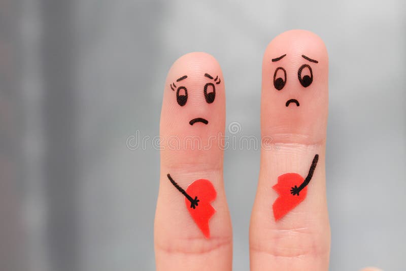 Finger art of couple holding broken heart. stock images Finger art of couple holding broken heart. stock images