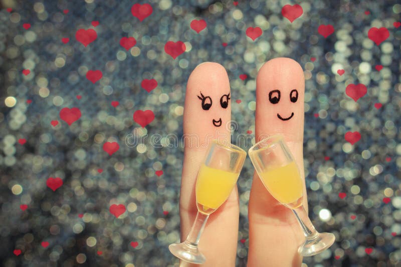 Finger art of a Happy couple. Couple making good cheer. Two glasses of champagne. Valentine s day.