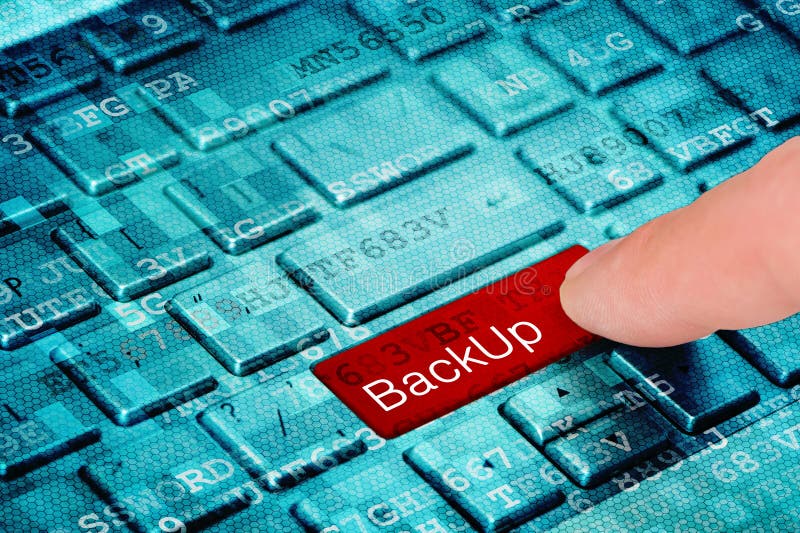 A finger press red BackUp button on blue digital laptop keyboard stock image