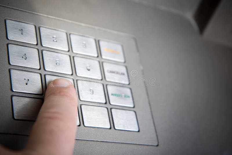 Finger pressing bank code stock photos