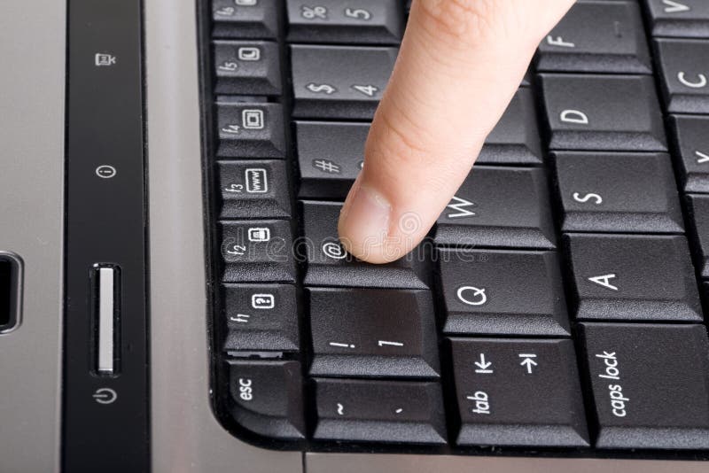 Finger pressing email symbol stock photo