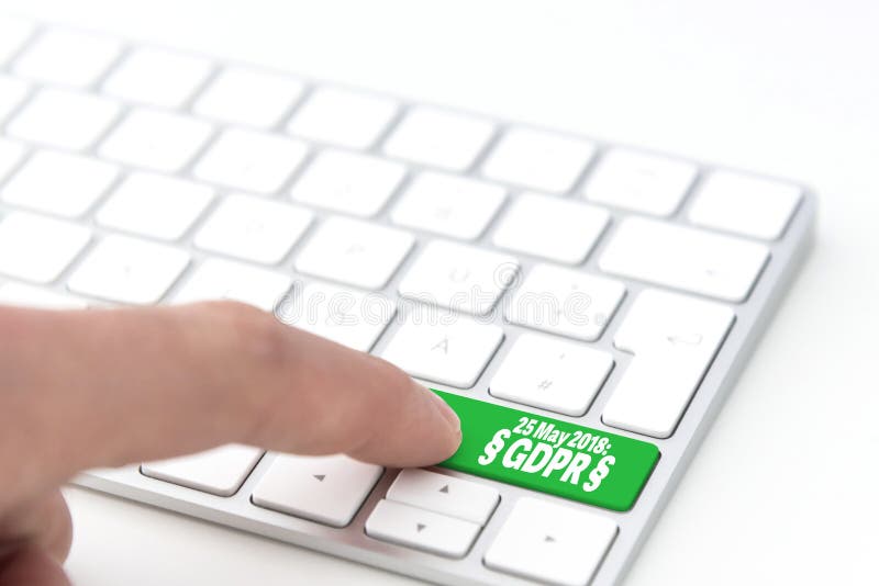 Finger pressing a green key labeled DSGVO, General Data Protection Regulation and commencement date stock photo Finger pressing a green key labeled DSGVO, General Data Protection Regulation and commencement date stock photo