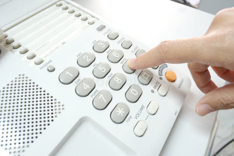 Finger pressing key on phone royalty free stock photo