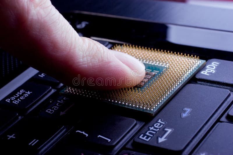 Finger pressing processor button royalty free stock photography