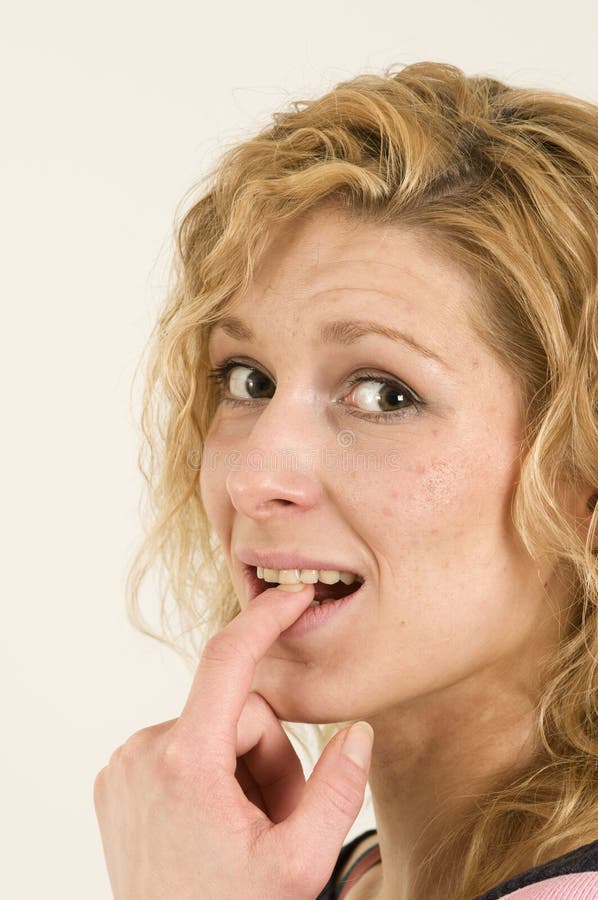 Finger at the teeth stock image. Image of concerned, mouth 12888081