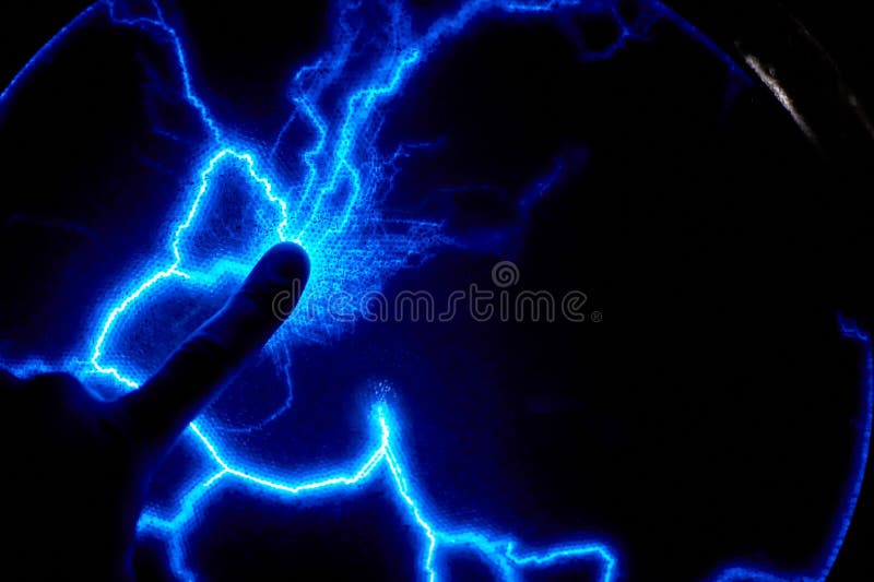 Finger Touch Electric Plasma Ball on a Dark Background. Static Electricity Model Stock Photo