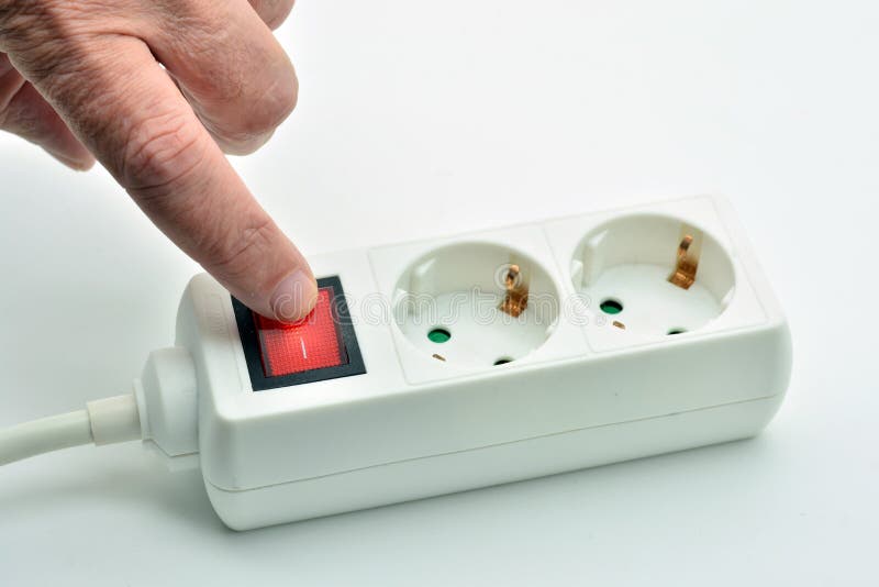 Finger turning off the power connector button stock images