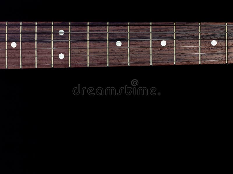 Fingerboard гитары изолированный на черной предпосылке стоковые фотографии rf Fingerboard гитары изолированный на черной предпосылке стоковые фотографии rf
