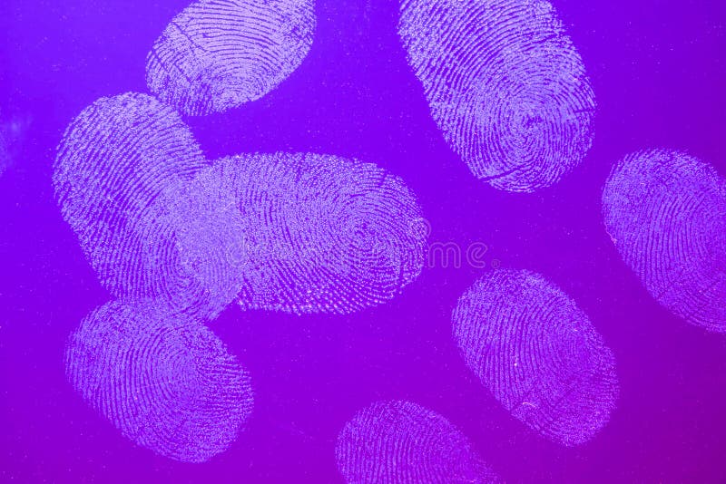 Fingerprints on glass with red and blue background stock images Fingerprints on glass with red and blue background stock images