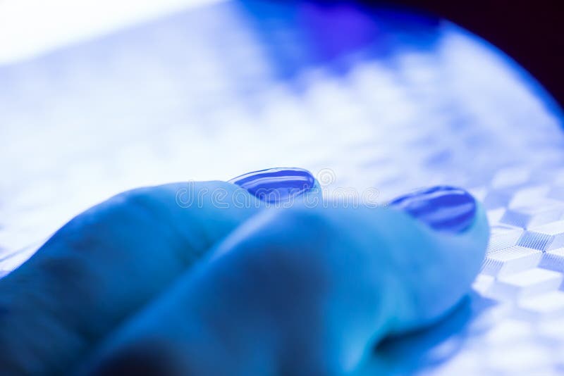 Fingers in Ultraviolet Lamp Stock Photo Image of ultraviolet