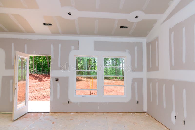 Finishing Plastering Drywall in Ready for Paint with New House Stock