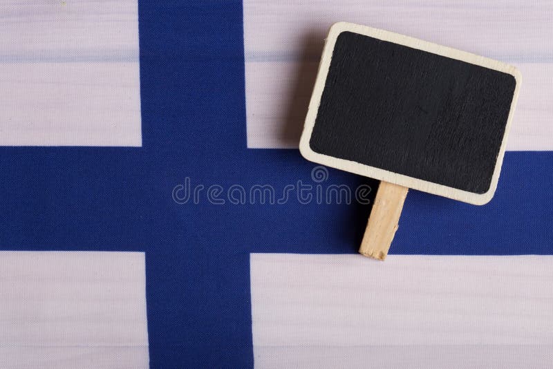 Finland Vlag en blanco bord Kopieerruimte stock afbeelding Finland Vlag en blanco bord Kopieerruimte stock afbeelding