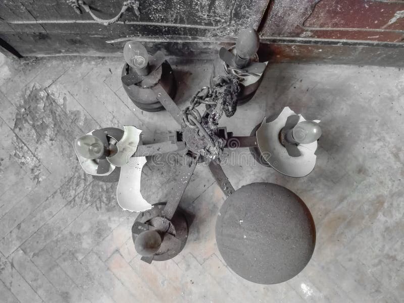 Broken Chandelier on the Floor of Living Room. Old and Dusty Fallen