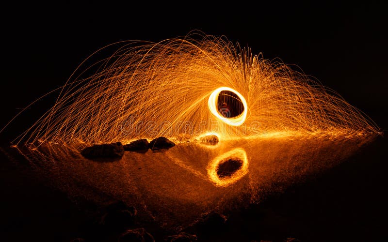 Fire ball long exposure stock photo. Image of light 153953742