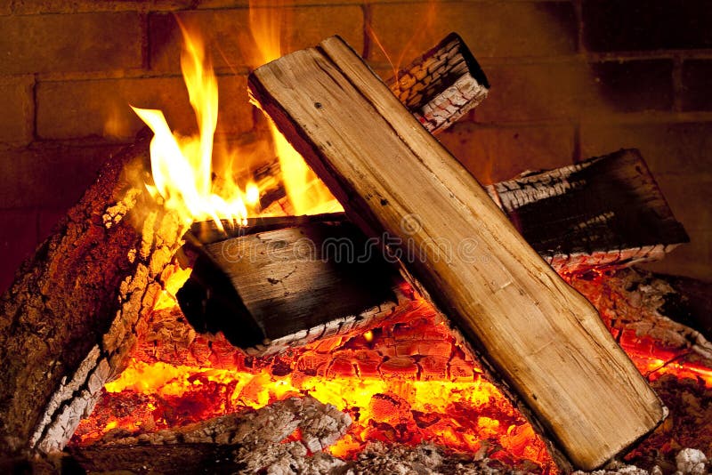Fire burning in fireplace stock photo. Image of glowing 16750678